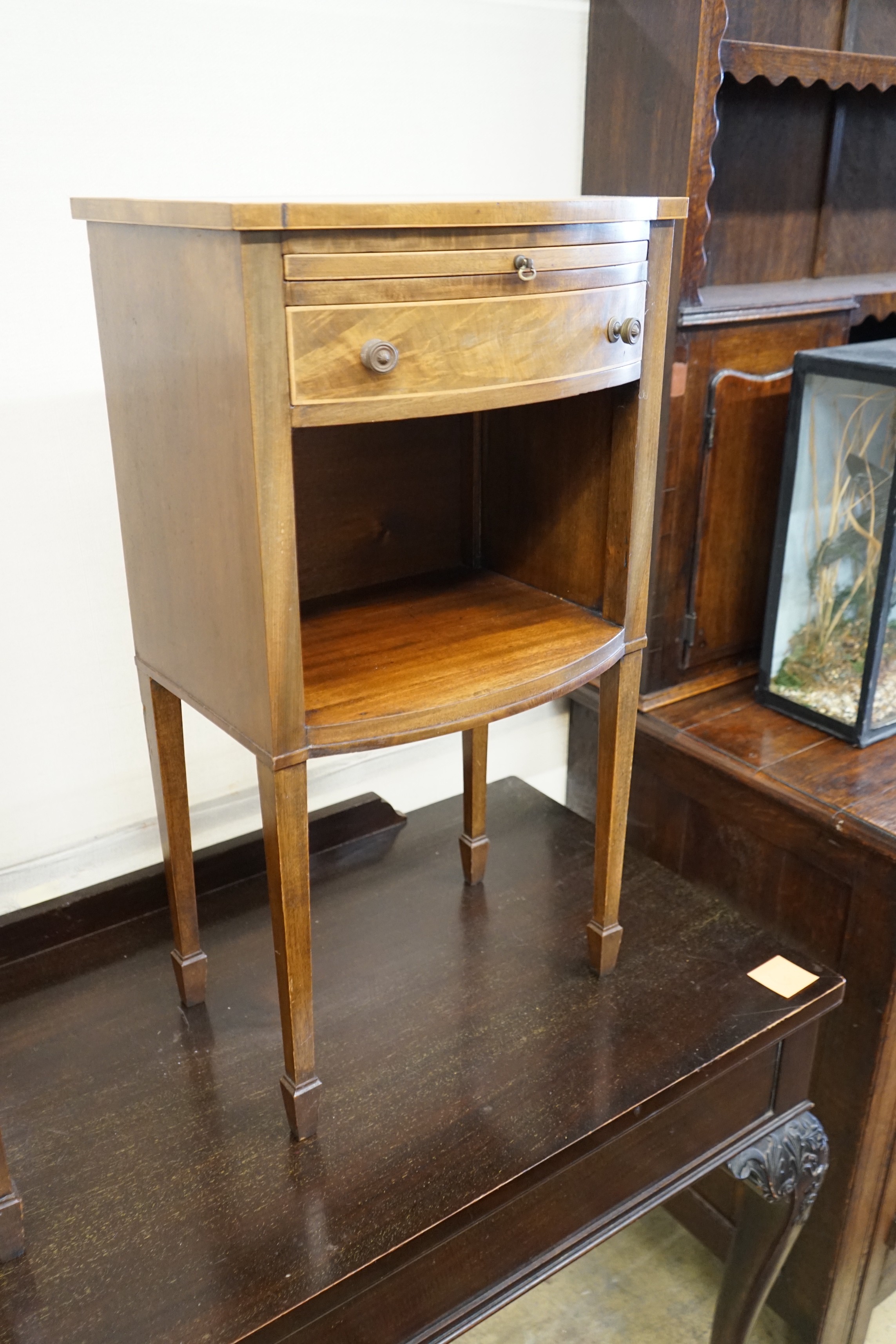 A pair of George III style mahogany bowfront bedside cabinets, width 40cm, depth 30cm, height 76cm